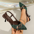 Zapatos de tacón destalonados con punta afilada y cadena metálica para mujer.