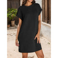 Vestido casual de mujer con mangas enrollables y bolsillos.