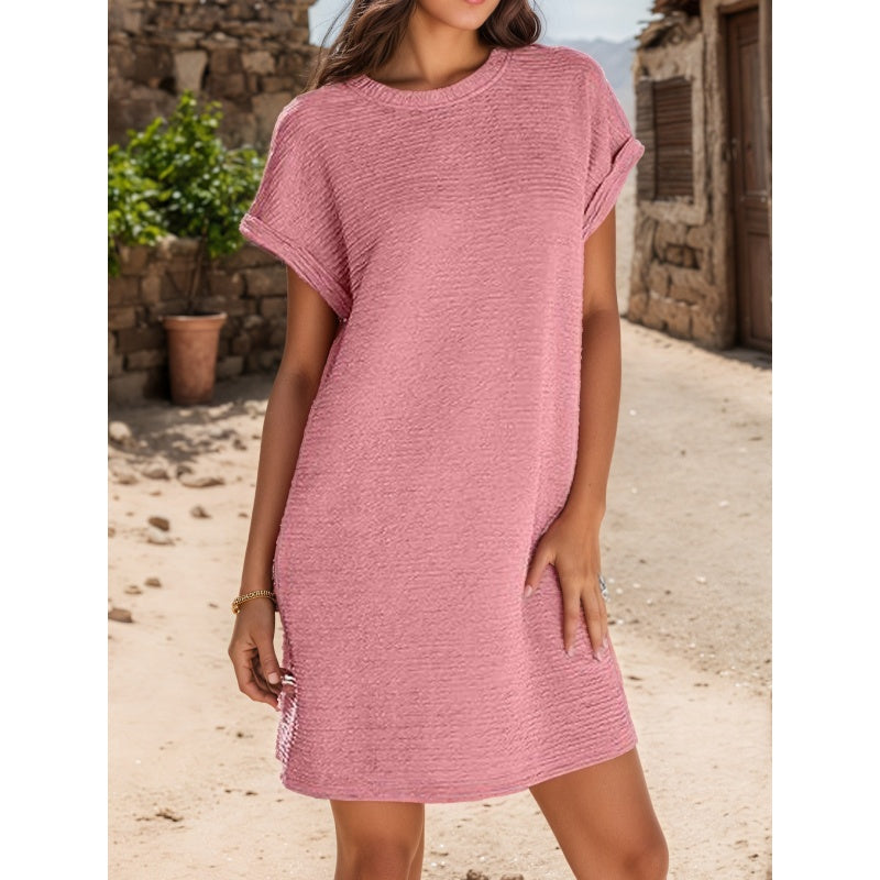 Vestido casual de mujer con mangas enrollables y bolsillos.