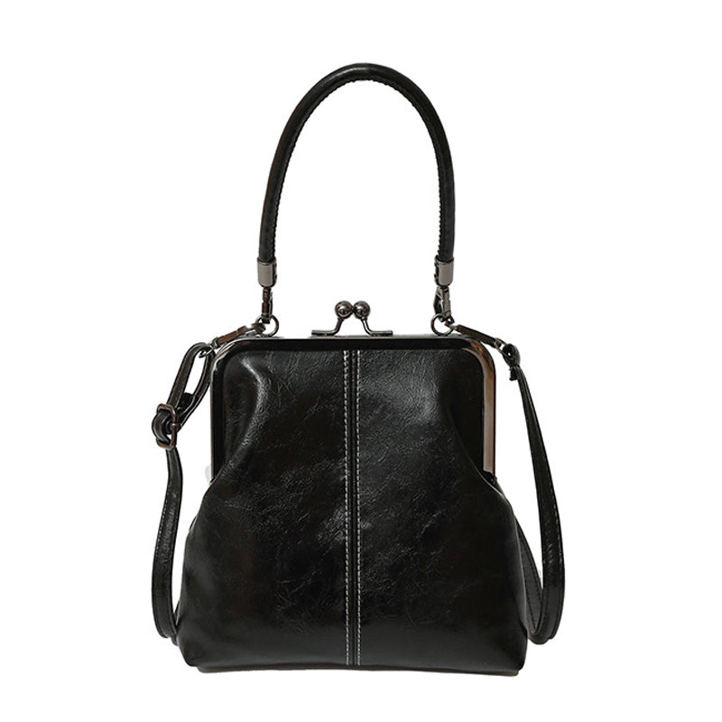 Bolso vintage con cierre de beso – 2 en 1: para llevar y organizar.
