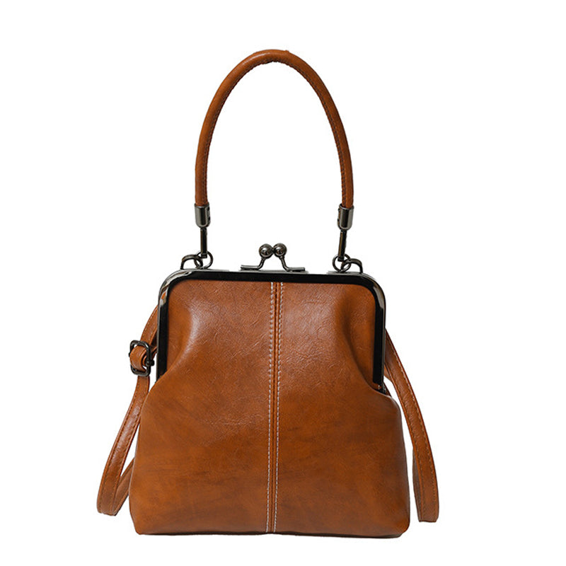 Bolso vintage con cierre de beso – 2 en 1: para llevar y organizar.