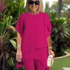 Conjunto de dos piezas para mujer: Top asimétrico elegante y pantalón de pierna ancha.