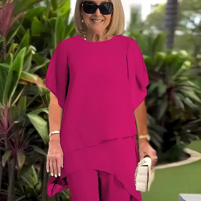Conjunto de dos piezas para mujer: Top asimétrico elegante y pantalón de pierna ancha.