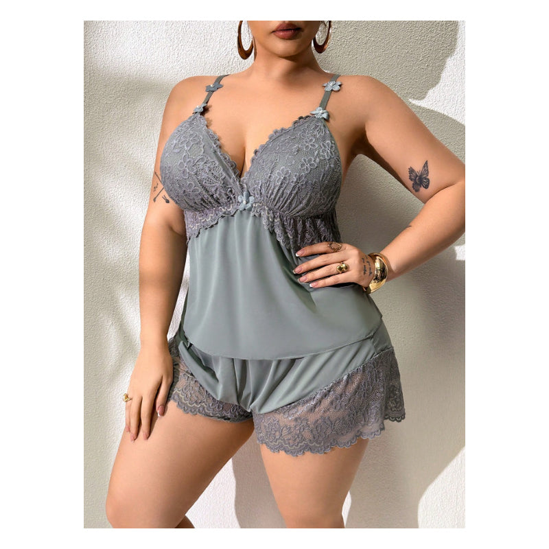 Conjunto de pijama con top sin mangas y shorts con ribete de encaje.