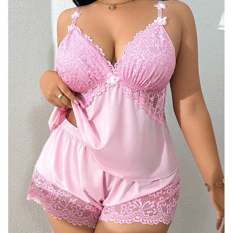 Conjunto de pijama con top sin mangas y shorts con ribete de encaje.