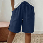 Pantalones cortos de verano para mujer con detalle de botón lateral