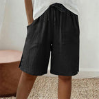 Pantalones cortos de verano para mujer con detalle de botón lateral