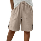 Pantalones cortos de verano para mujer con detalle de botón lateral