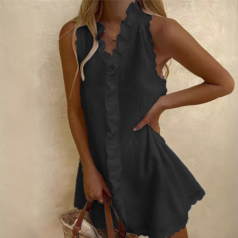 Vestido de manga corta con volantes y detalle de lazo en la parte delantera.