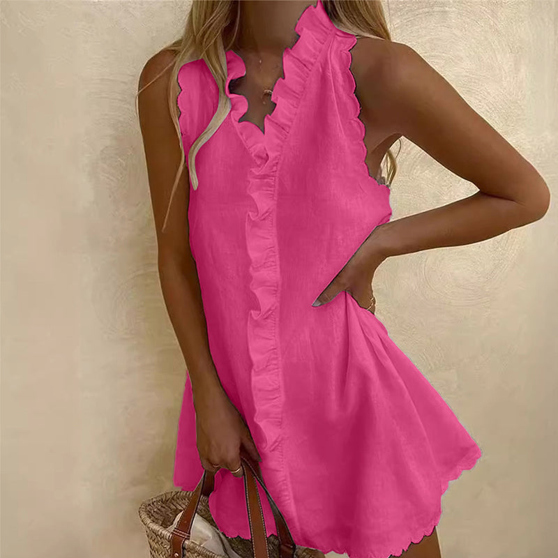 Vestido de manga corta con volantes y detalle de lazo en la parte delantera.